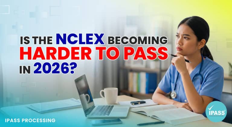 Featured image for Is the NCLEX Becoming Harder to Pass in 2026?, showing a nurse in blue scrubs studying at a desk with a laptop and notes beside bold text about NCLEX difficulty in 2026